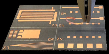 Copper track peeled from a printed circuit board